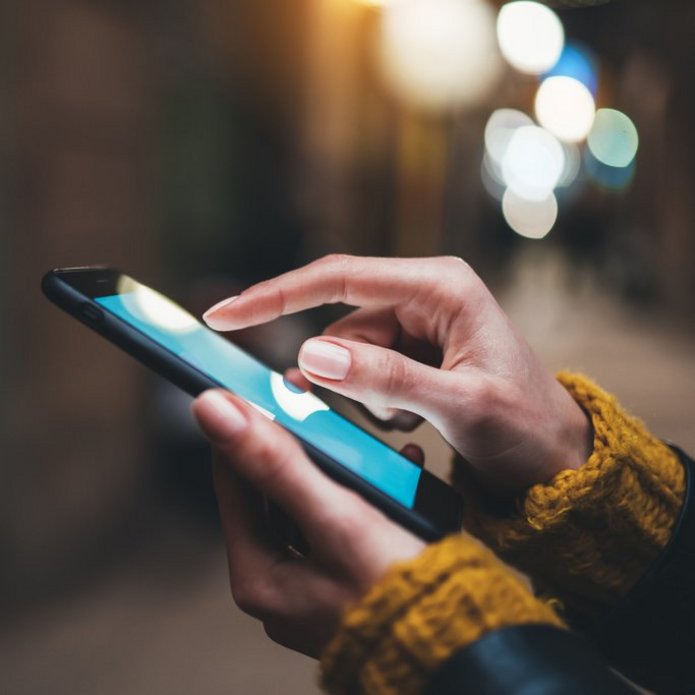 a decorative element: an individual using a phone